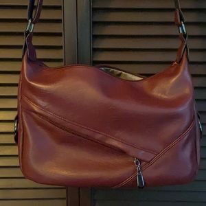 Crossbody or shoulder bag burgundy only used once